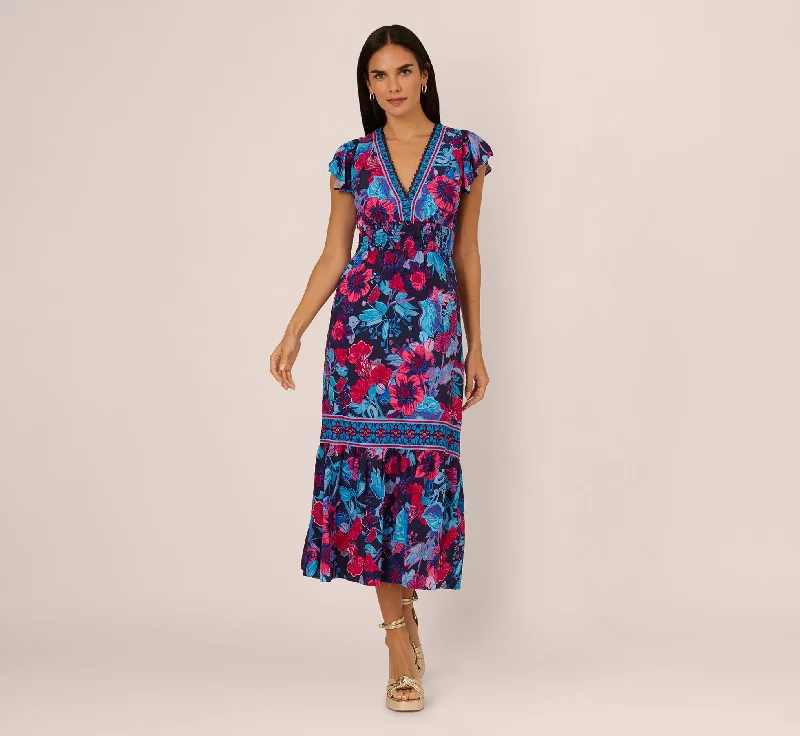 Elegant spring dresses for a wedding guest look -Bright Floral Print Midi Dress With Flutter Sleeves In Navy Pink Multi Elegant spring dresses for a wedding guest look -Bright Floral Print Midi Dress With Flutter Sleeves In Navy Pink Multi
