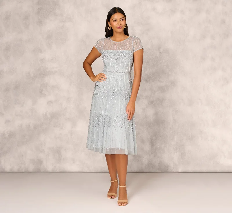 Best wedding guest dresses for weddings with traditional themes -Beaded Short Sleeve Midi Dress With Sheer Details In Snow Globe Best wedding guest dresses for weddings with traditional themes -Beaded Short Sleeve Midi Dress With Sheer Details In Snow Globe